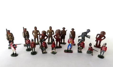 Grouping of 19 lead and cast iron toy figures including: 6 cast iron WWI soldiers with traces of