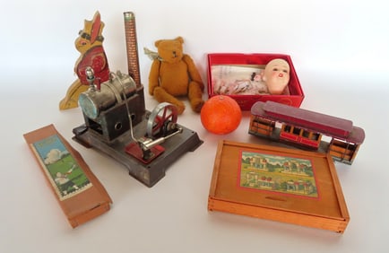 Grouping of vintage toys including: Small jointed Teddy Bear circa 1950-70; German doll head; wooden