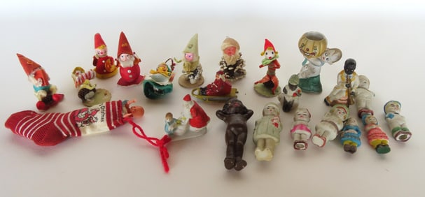 Grouping of 10 figural Christmas ornaments and 12 miniature porcelain figures, most seem to be circa