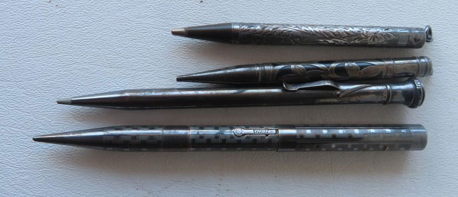 Grouping of 4 sterling silver lead pens including Sharp, Waterman, Newpoint, and 1 unmarked by