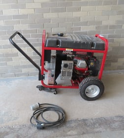 A Generac 5500XL generator, with heavy duty cable marked 30A 125/250V Grounding. Provenance: From a