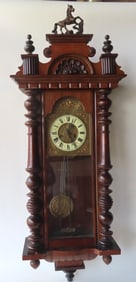 A Renaissance Revival English Wall Clock, circa 1875.