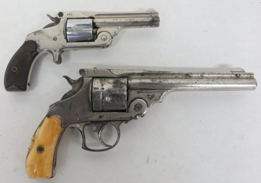 Two antique revolvers including a Smith & Wesson 6 shoo: Two antique revolvers including a Smith & Wesson 6 shooter and an unsigned 6 shooter with bone handles. NOTE - LIVE BACKGROUND CHECKS TO BE COMPLETED FOR ALL GUN PURCHASES. Provenance: From a Yonkers