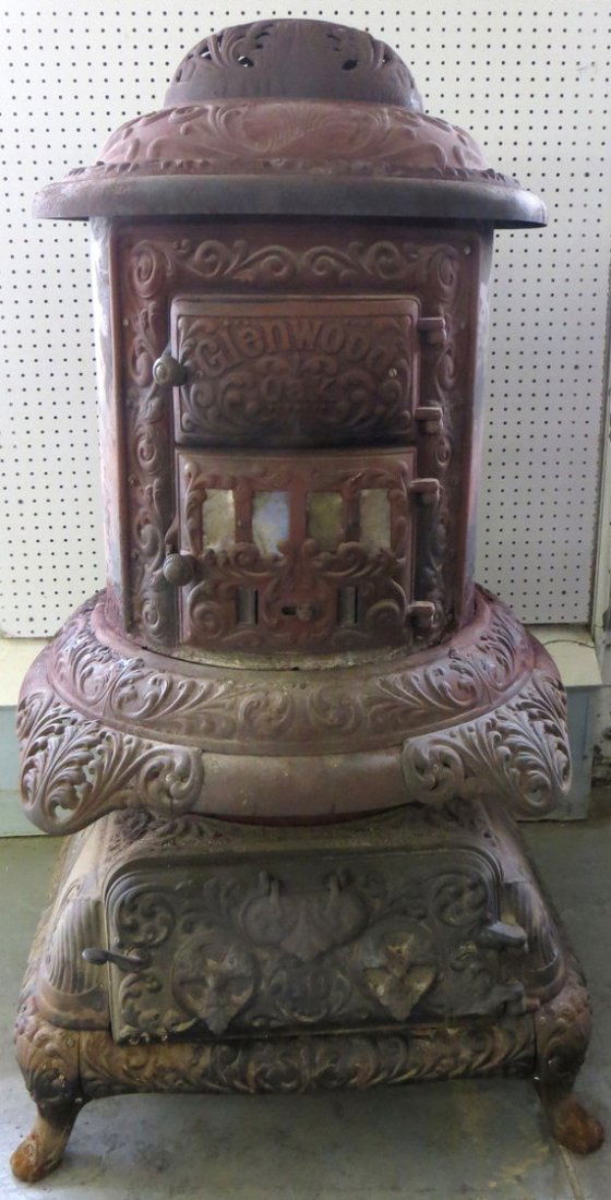 Large cast iron pot belly stove signed Glenwood Oak No.: Large cast iron pot belly stove signed Glenwood Oak No. 50 - missing finial - 54"H.