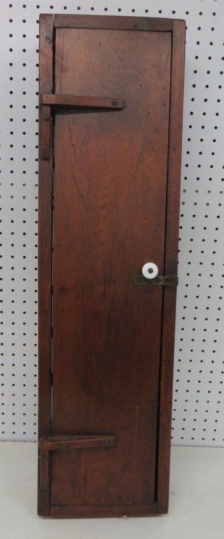 Small 1 door pine wall cupboard.: Small 1 door pine wall cupboard. 34.5"H x 9.75"W x 4"D. Late 19th to early 20th century.