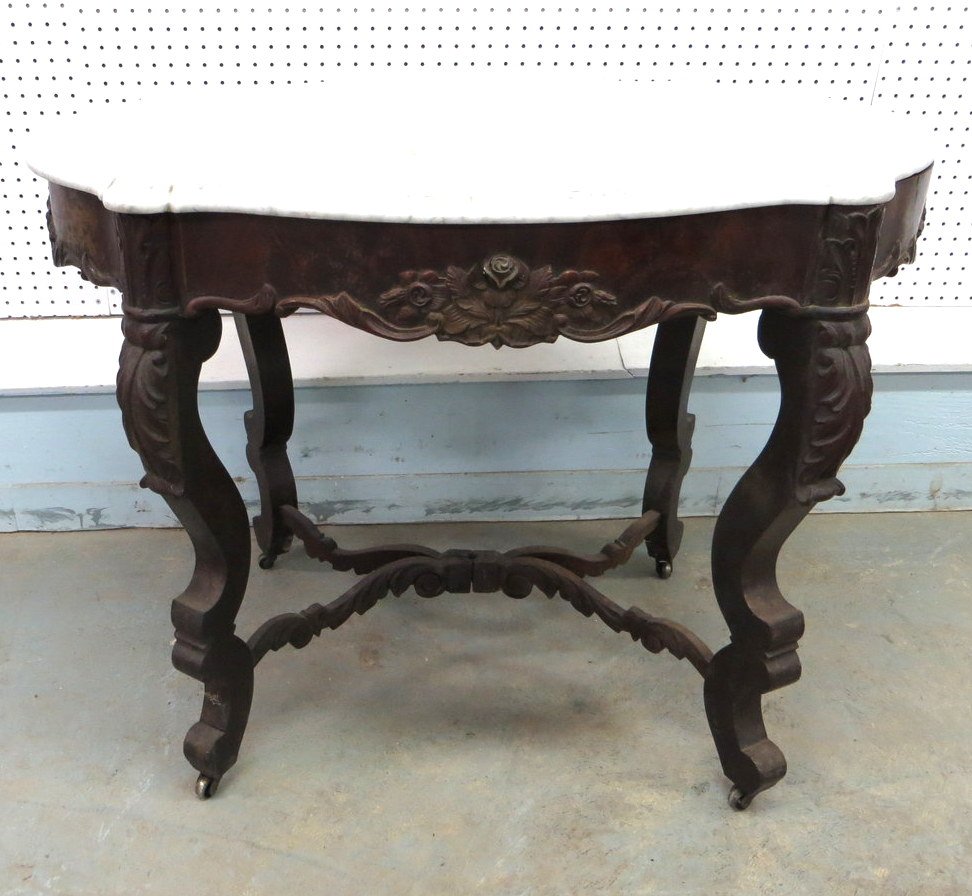 Victorian turtle form marble top parlor table - base in: Victorian turtle form marble top parlor table - base in mahogany.