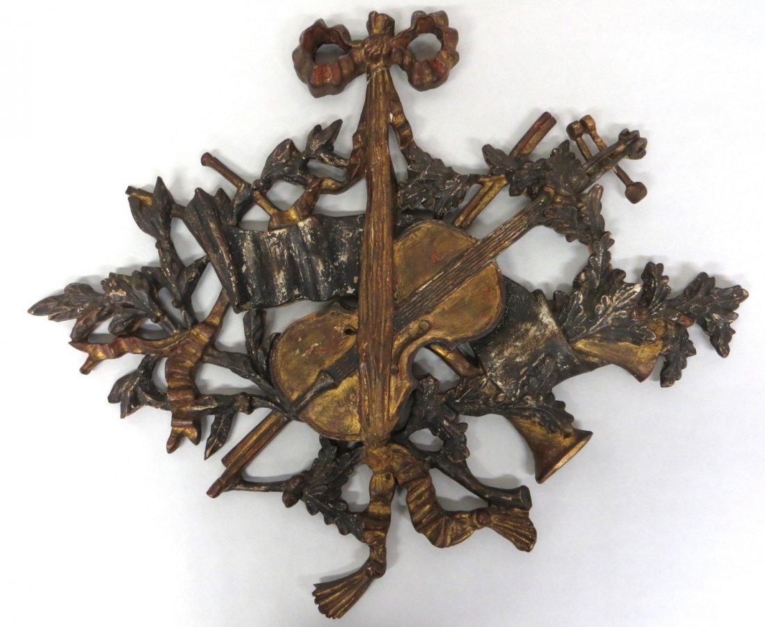 Early gesso over wood hand carved reticulated, musical : Early gesso over wood hand carved reticulated, musical theme, wall plaque decorated with violin, horn, scrolls, acorns, leaves, etc. Original gold leaf paint - 17th century or earlier - early repairs
