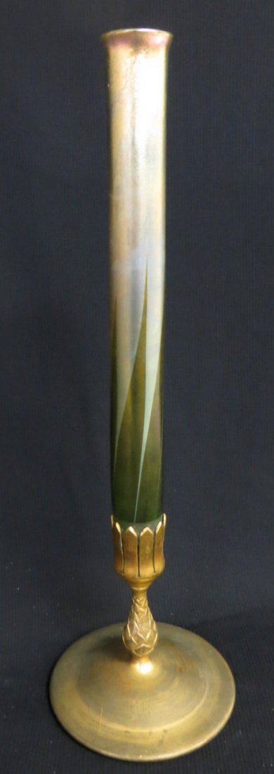 Tiffany Favrile iridescent art glass vase with green le: Tiffany Favrile iridescent art glass vase with green leaf decoration on bronze base - Base signed Tiffany Studios New York 1043 - vase signed L.C.T. Favrile. Note bronze base also with engraved monogr