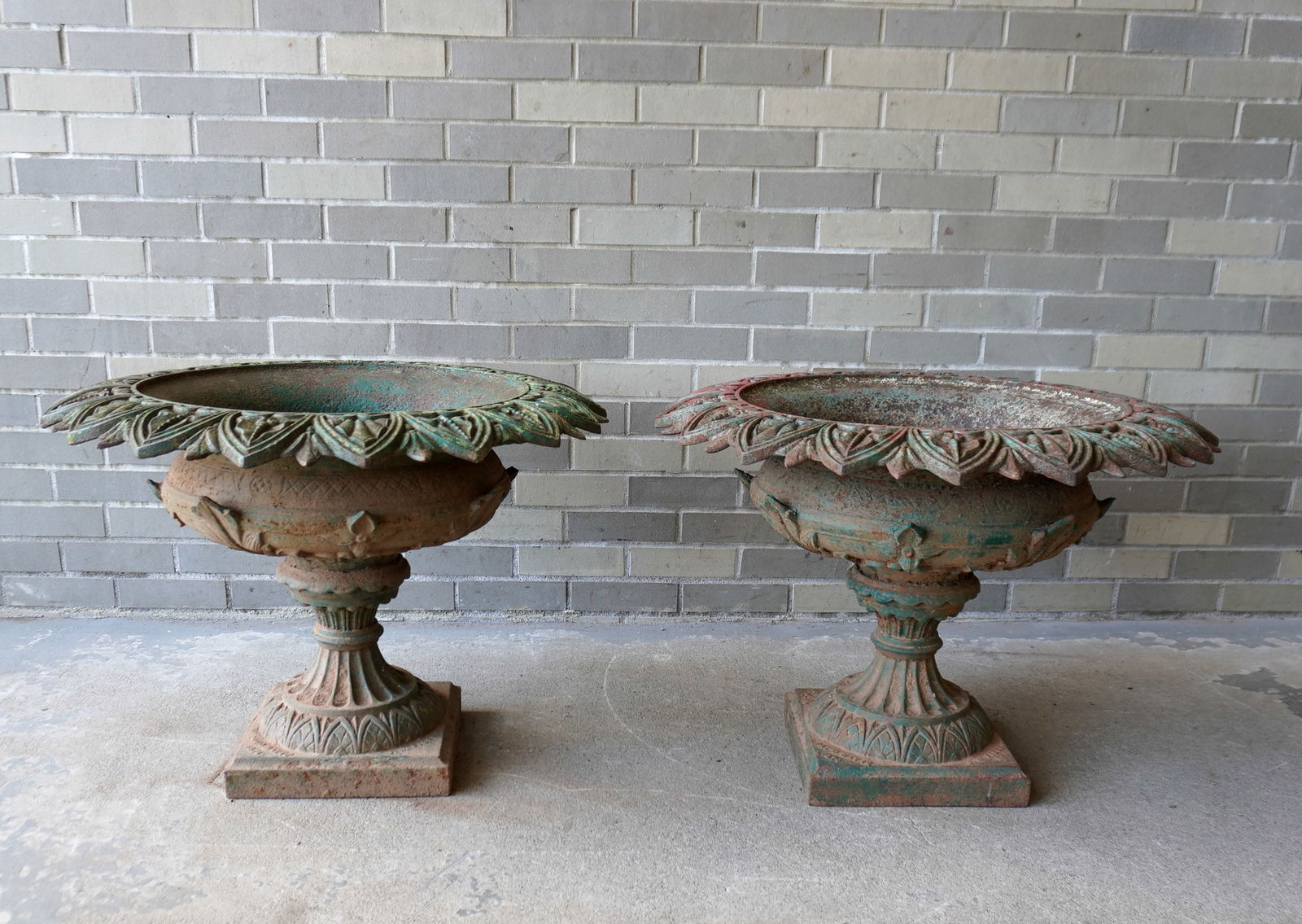 A very fine pair of Fiske cast iron garden urns signed on base "J.W. Fiske / No. 21 & 23 / Barclay: A very fine pair of Fiske cast iron garden urns signed on base "J.W. Fiske / No. 21 & 23 / Barclay St. / N.Y./ Pat'd May 12 1874". Traces of original paint and overall very good condition. Each measur