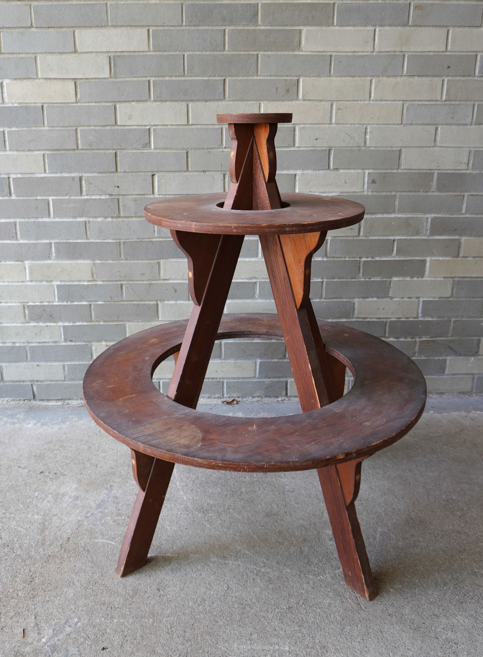A round wooden 3 tier planter, probably mid 20th century, good condition. Measures 36 3/4"H x 30"D: A round wooden 3 tier planter, probably mid 20th century, good condition. Measures 36 3/4"H x 30"D (lower tier). Provenance: From the Marni Bakst and William Sadler collection of antiques, Verbank NY.