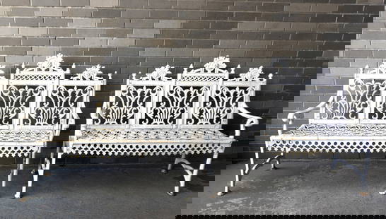 Pair of matching American Gothic cast iron garden settees with openwork seats, circa 1870-90. Each: Pair of matching American Gothic cast iron garden settees with openwork seats, circa 1870-90. Each signed "Mfg. By / N.Y./ Empire Foundry Troy N.Y.". One chair with a very small repair to edge of