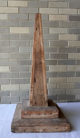 A hand made wooden obelisk mounted on a chamfered double stepped base, late 19th century - good