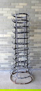 A large French bottle drying rack, galvanized metal, good condition. Measures 59"H x 15" diameter at: A large French bottle drying rack, galvanized metal, good condition. Measures 59"H x 15" diameter at top to 22" diameter at base. Provenance: From the Marni Bakst and William Sadler collection of
