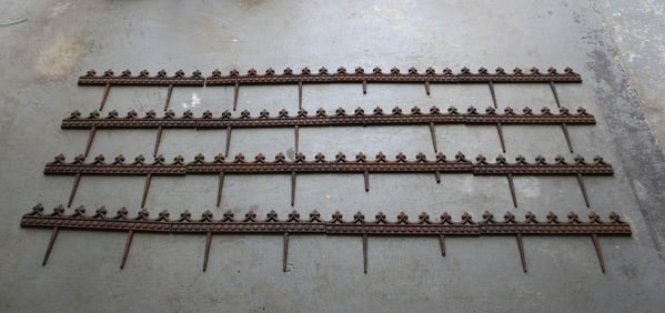 Grouping of 16 sections of Victorian cast iron garden border edging, 19th century. Each section