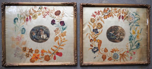 A pair of early English theorem watercolors on silk, both having a floral and vine wreath