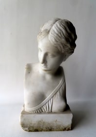 A marble bust of a classical Roman or Greek goddess, partially nude, 19th century, not signed. Good
