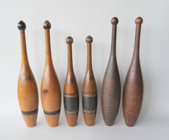 Three sets of vintage wooden Indian clubs, probably early 20th century. The first pair in maple with