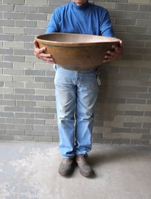 The best monumental primitive treenware bowl with round footed base and molded edge to rim, original