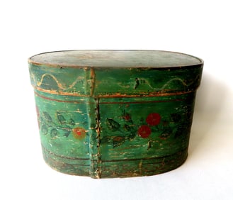 An early Scandinavian bride's box decorated with flowers on all sides. Some use wear to paint, but