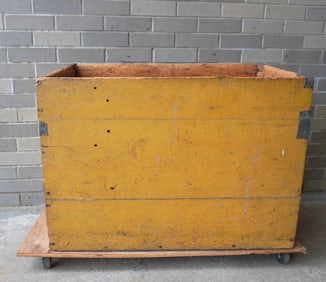 A good primitive wood box in original yellow paint - metal straps have been added to corners for
