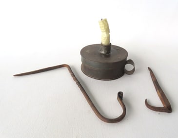 Three early lighting related tin and iron collectibles including: An early combination tin tinder
