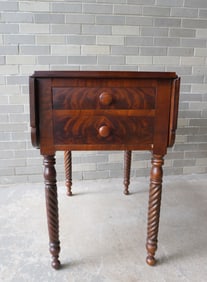 A high quality mahogany dropleaf 4 drawer partner's sewing or game table with 2 drawers each side in