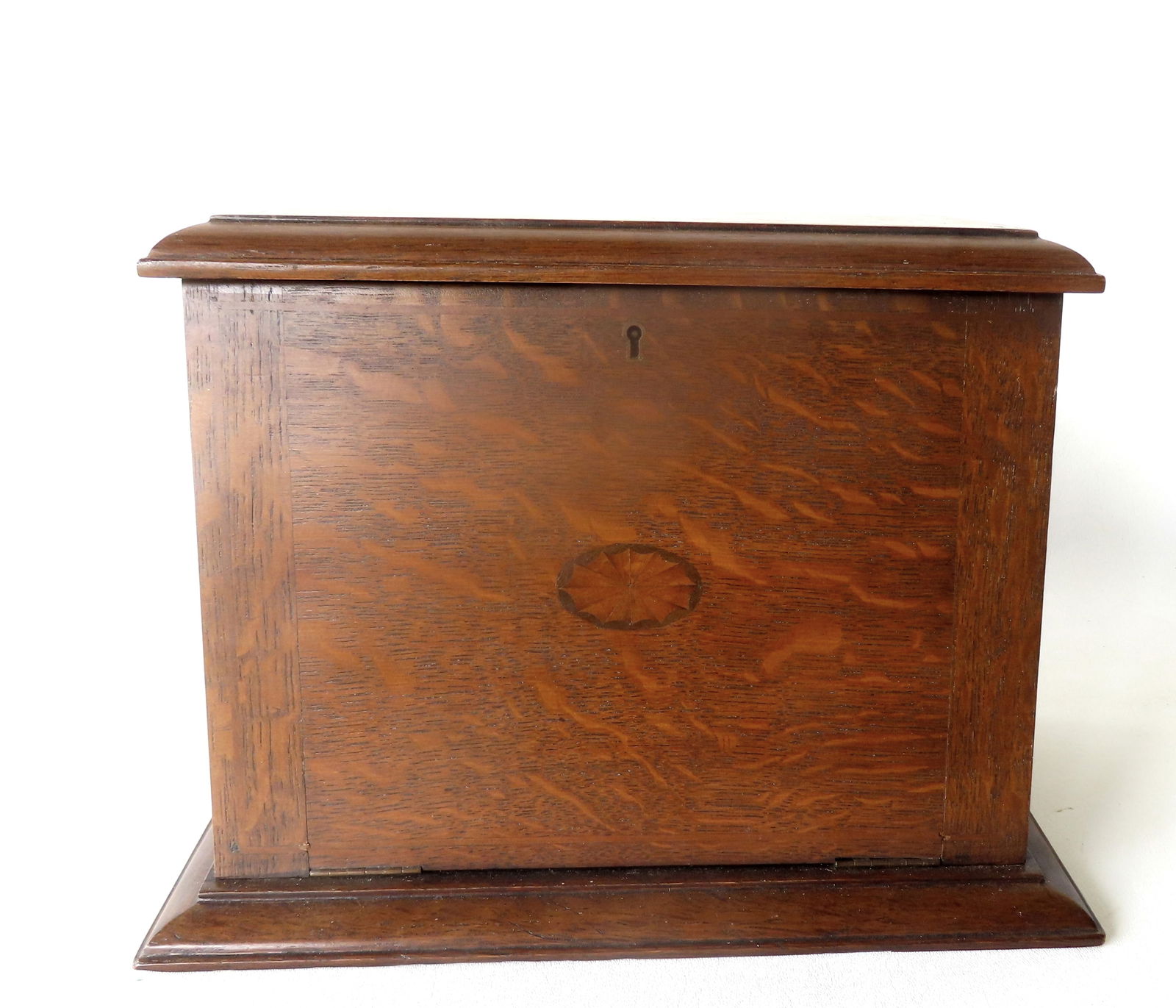 A good oak drop-front letter box having an inlaid fan with oval in top and front, early 20th: A good oak drop-front letter box having an inlaid fan with oval in top and front, early 20th century. Measures 13 1/4"W x 37"D x 9 1/2"H. Provenance: From the Marni Bakst and William Sadler collection