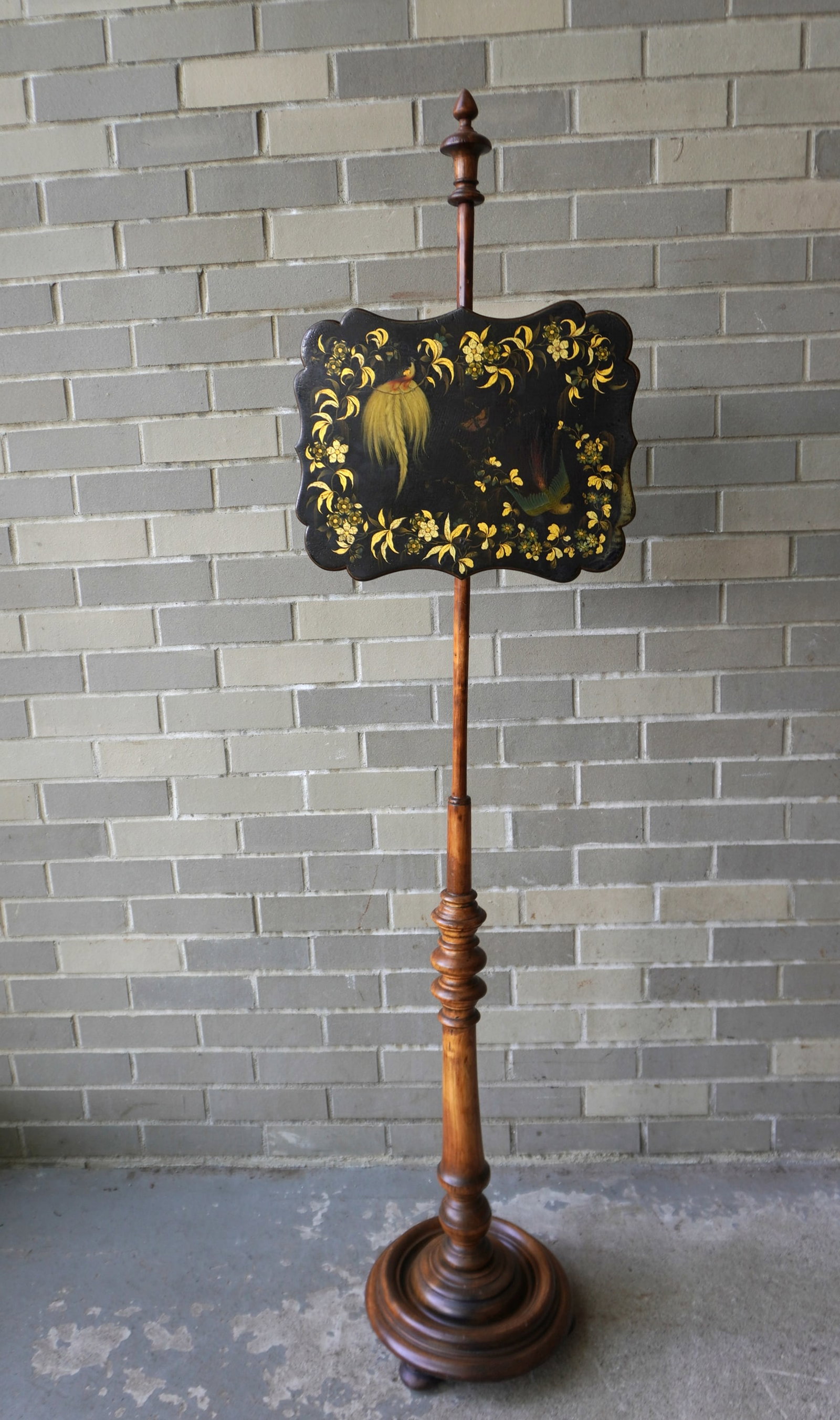 A Victorian wooden adjustable wooden pole screen. The pole in natural wood, has been refinished, and: A Victorian wooden adjustable wooden pole screen. The pole in natural wood, has been refinished, and is attached to a circular wooden footed base. The shaped wooden screen is all original, with a hand
