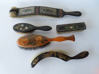 Grouping of 5 lacquered and hand painted brushes, several hair brushes, all in good condition, late