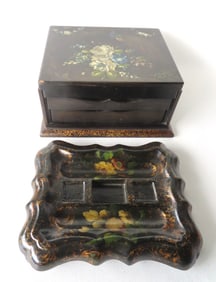 Two black lacquered 19th century collectibles including: A tin desk set decorated with hand painted