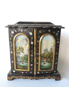 An outstanding black lacquered Victorian souvenir lady's dresser or sewing box, having a lift top