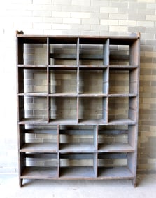 A primitive floor standing cubby hole unit in original blue-green paint, late 19th century. Two of