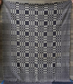 Blue and white 2 piece coverlet with hand sewn middle seam, geometric pattern, early to mid 19th