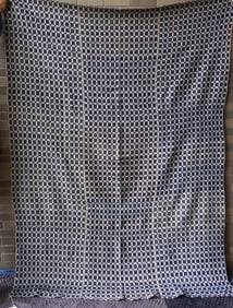 An unusual 2 seam blue and white woven coverlet (3 woven sections hand sewn together, making it