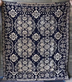 A good Fishkill, Dutchess County NY, blue and white Jacquard coverlet, decorated with a leaf and