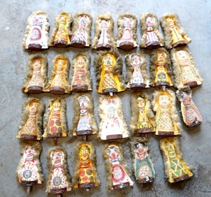A grouping 27 vintage canvas carnival knock-down dolls in original paint, all with wooly hair,