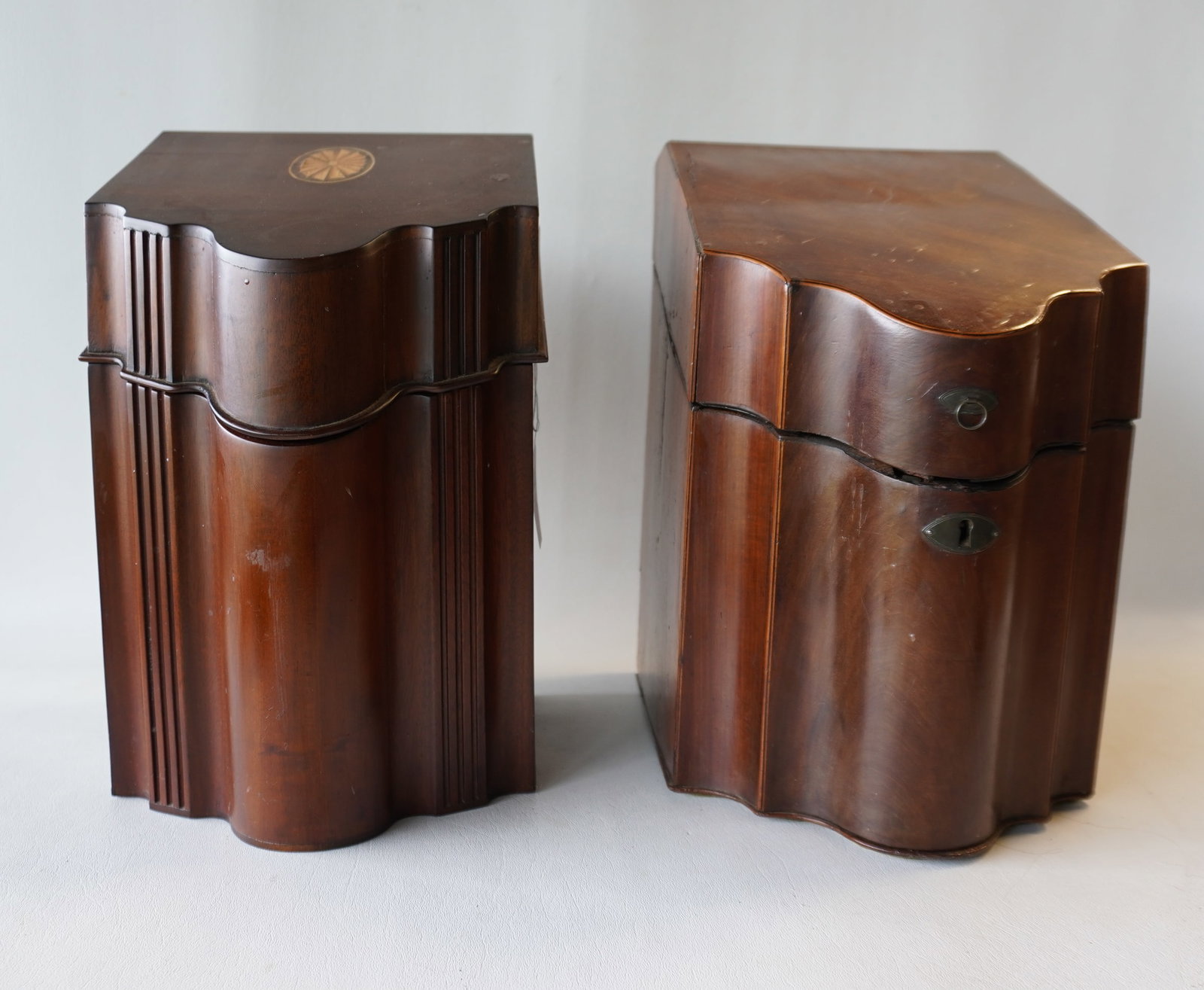 Two knife boxes including: An original 18th century mahogany knife box with original fitted interior: Two knife boxes including: An original 18th century mahogany knife box with original fitted interior and having an inlaid star on underside of lid - some cracks to veneer, loss to edge beading, loss t