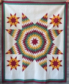 A patchwork quilt in the "Bethlehem Star" pattern, excellent condition, all hand sewn with very fine
