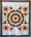 A patchwork quilt in the "Bethlehem Star" pattern, excellent condition, all hand sewn with very fine