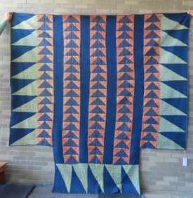 A very fine 4-poster bed quilt, either satin or silk, Flying Geese pattern, probably Amish 19th