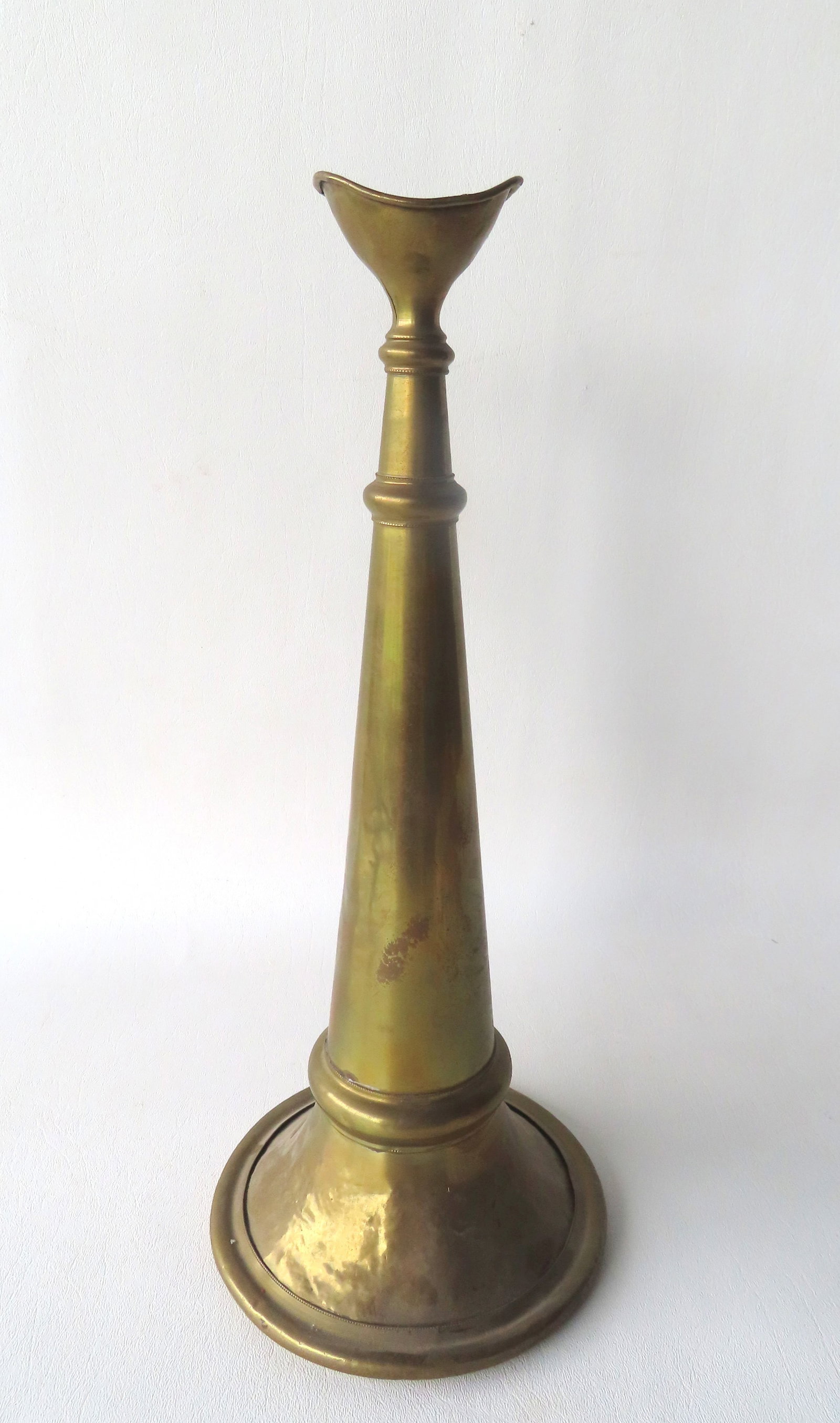 A brass fireman's speaking horn, 19th century. Small split in brass on mouthpiece, some small dents,: A brass fireman's speaking horn, 19th century. Small split in brass on mouthpiece, some small dents, mostly at bell, otherwise good overall condition. Measures 16"H x 6 1/2" diameter at bell.