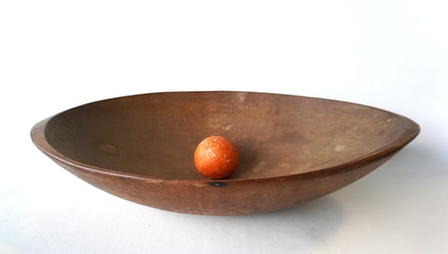 A choice large size oval treenware bowl, early to mid 19th century. All original with excellent