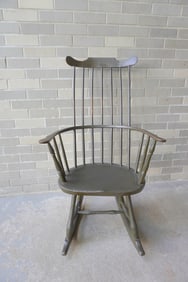 A good Windsor fan-back rocker in old crusty dark green paint which appears to be original as are