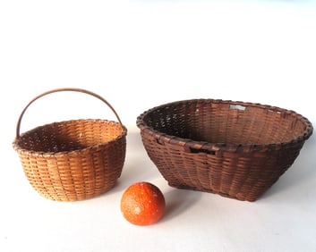 Two early splint woven baskets, both mid to late 19th century. The first in exceptional form and
