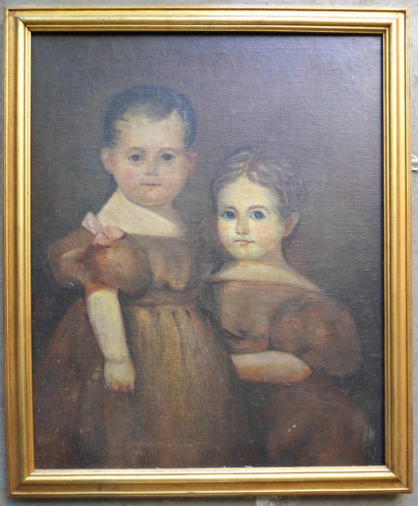 O/C American portrait of sister and brother (the brother wearing dress), circa 1870-80, very good: O/C American portrait of sister and brother (the brother wearing dress), circa 1870-80, very good condition. Boston art gallery label on reverse marked "Doll and Richards" with inventory number 5243 -