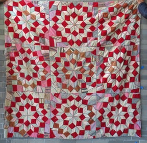 A late Victorian winter wool quilt, "Mystery Star" pattern but in Crazy Quilt style, hand sewn and