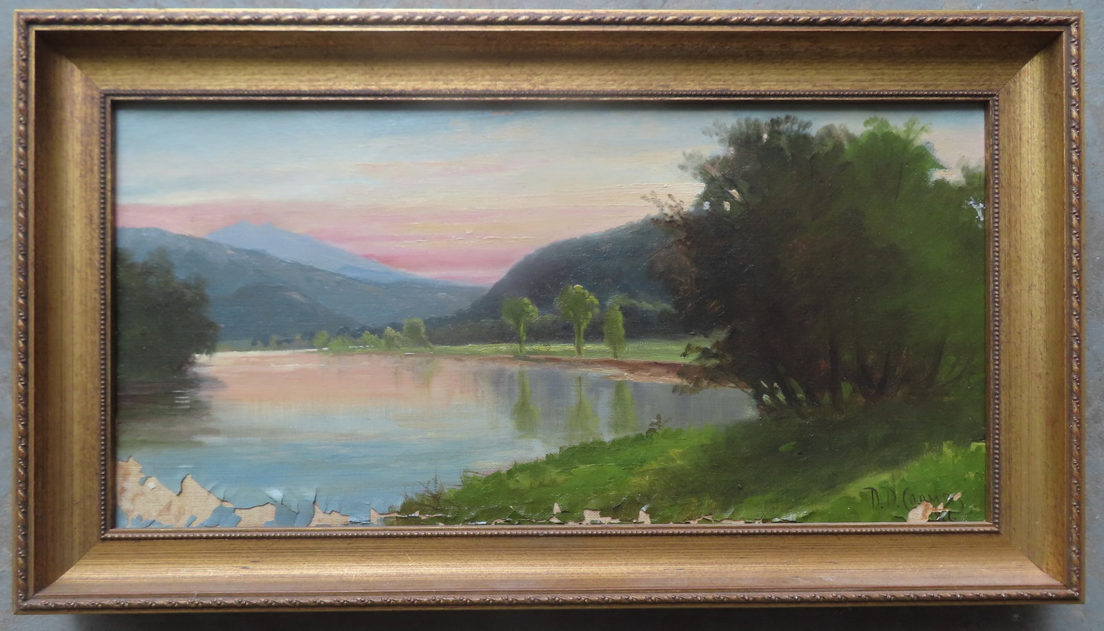 Delbert Dana Coombs (1850 - 1938) was active/lived in Maine. O/C Country landscape with lake/river: Delbert Dana Coombs (1850 - 1938) was active/lived in Maine. O/C Country landscape with lake/river bordered by trees and mountains in background, signed D.D. Combs 1886 (paint loss along the bottom ed