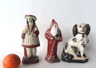Three chalkware figures including: Spaniel dog - some overpaint and surface wear else good condition
