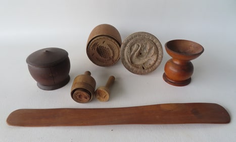 Grouping of country treenware including butter stamp of pineapple - mid to late 19th century, an