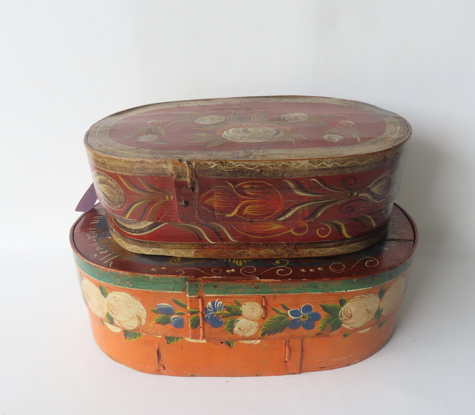 Two Scandinavian bride's boxes in original paint, 19th century. The first decorated with hand: Two Scandinavian bride's boxes in original paint, 19th century. The first decorated with hand painted flowers including tulips - varnished surface with some paint wear to lid, otherwise very bold colo
